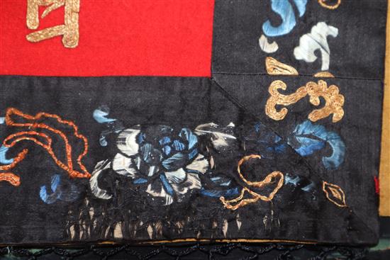 A Chinese embroidered silk dragon wall hanging, early 20th century